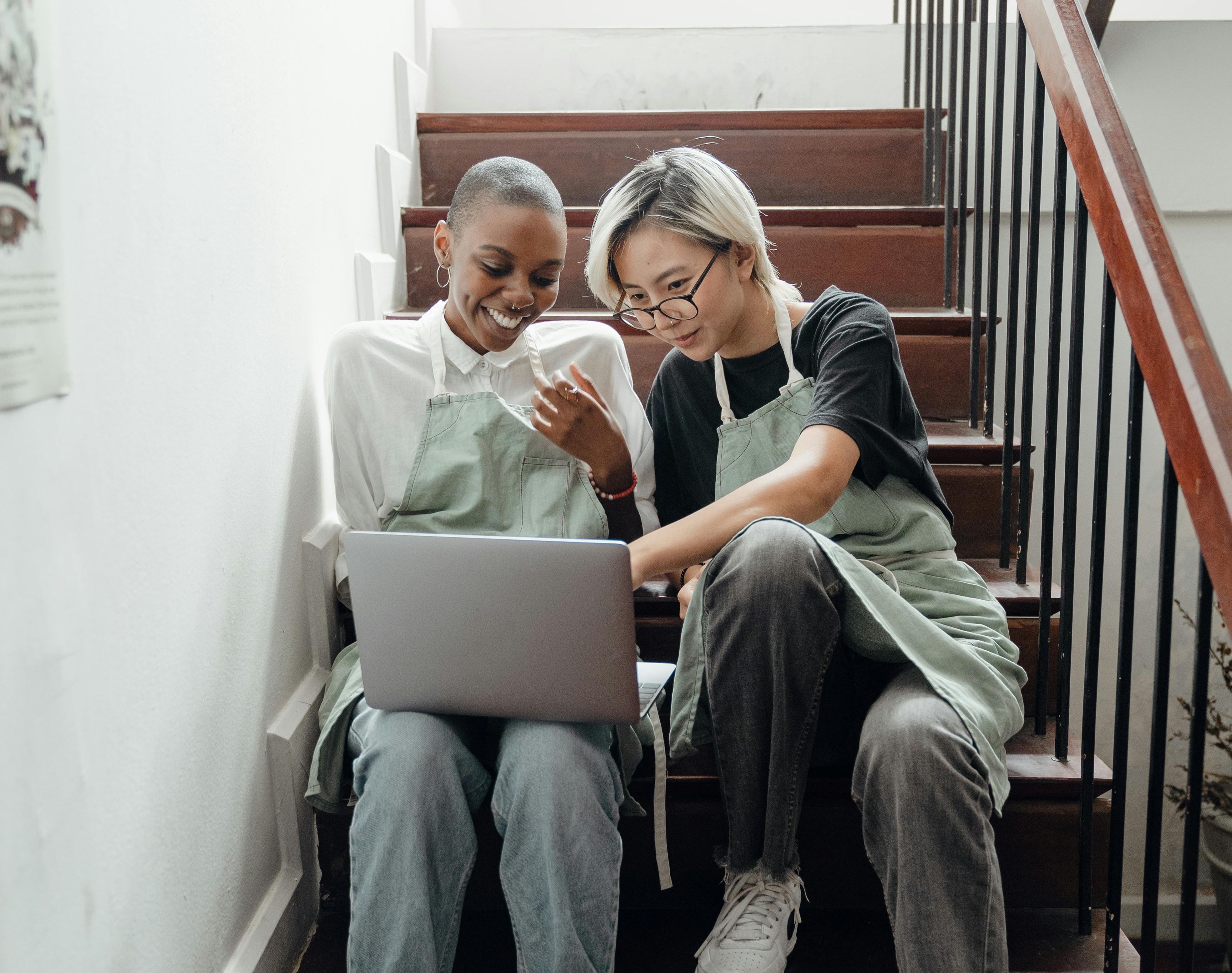 Person with curly hair in neon lighting